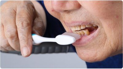 Teeth brushing old women