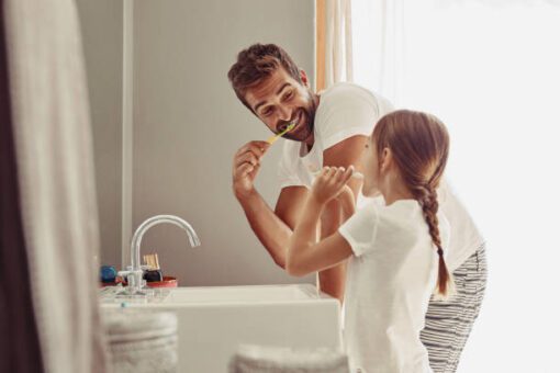 father daughter brushing